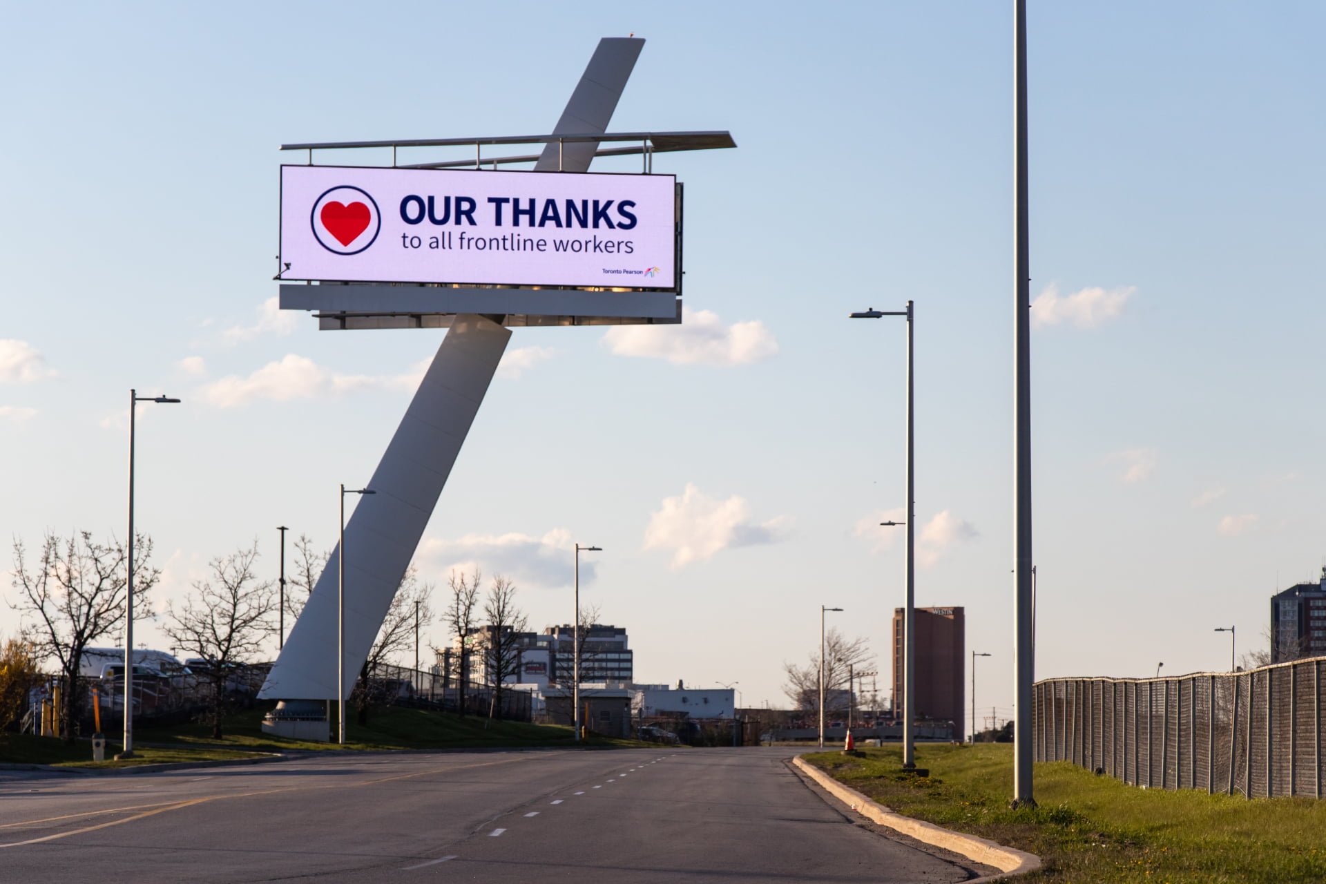 Billboard thanking frontline workers during the COVID-19 pandemic near Toronto Pearson International Airport.